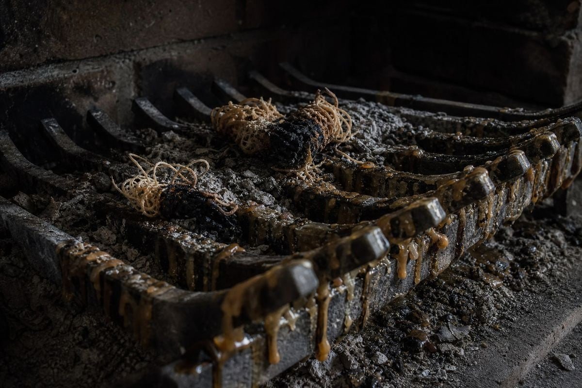 Preventing Wax Buildup Melted paraffin wax dripping through fire pit grates causing residue buildup (ID#3)